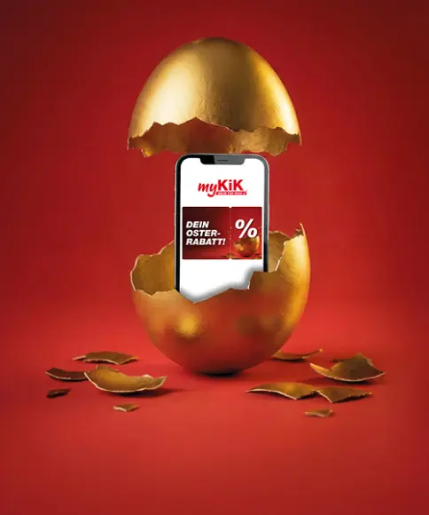 Goldenens Ei ist aufgebrochen und zeigt ein Smartphone mit einem Rabattangebot sowie dem auffälligen Schriftzug „Knack das goldene Ei“.